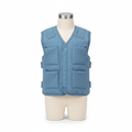 Kids weighted vest in soft blue fabric with adjustable weight pockets